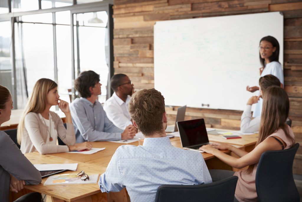 Female entrepreneur giving presentation